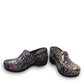Dansko XP 2.0 patent clogs featuring a colorful confetti pattern and slip-resistant rubber outsoles.