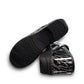 Dansko XP 2.0 patent clog showing the black slip-resistant rubber outsole and glitter wave pattern.