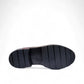 David Tyler forest green patent leather loafer with a chunky non-slip sole and leather lining. Photo of bottom view.