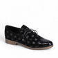 DJANGO & JULIET KOTTY black leather loafers with polka dot pattern and patent leather toe cap. Photo of front side view.