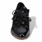 DJANGO & JULIET KOTTY black leather loafers with polka dot pattern and patent leather toe cap. Photo of front view.