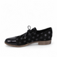 DJANGO & JULIET KOTTY black leather loafers with polka dot pattern and patent leather toe cap. Photo of left side view.