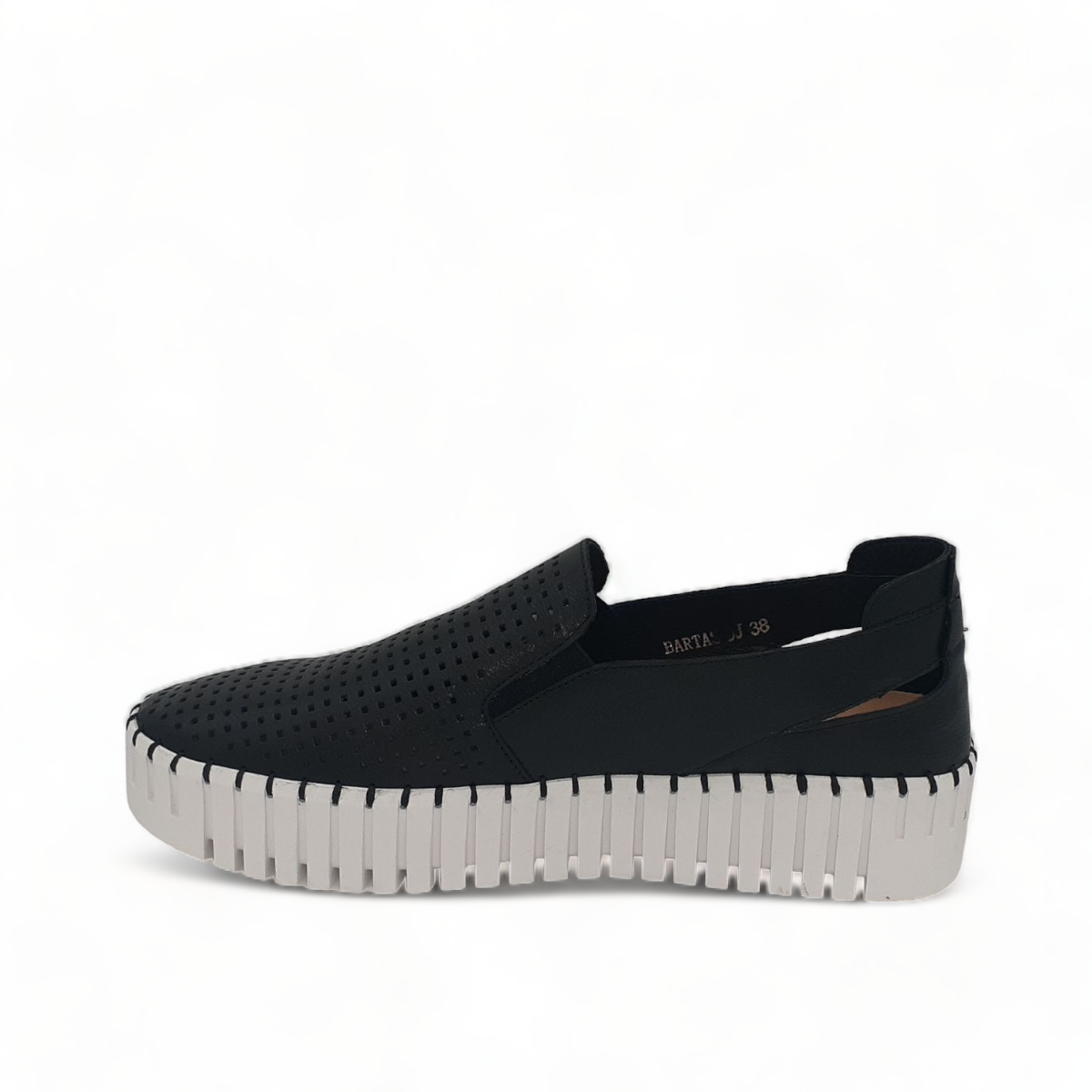 Django & Juliette black leather slip-on sneakers with perforated detail and thick white cleated sole. Photo of left side view.