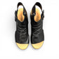 Django & Juliette Rufuss black leather wedge sandals with cut-out design and buckled ankle strap. Photo of upper view.