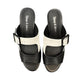Django & Juliette Conrade black and cream leather heeled sandals with a buckle detail. Photo of upper view.