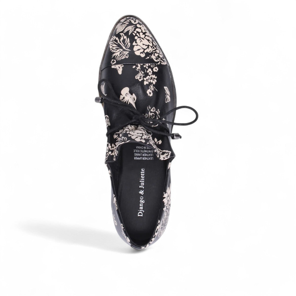 DJANGO & JULIETTE Kotty black and milk floral leather loafer with lace-up detail and rubber outsole. Photo of upper view.