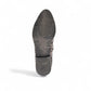 Django & Juliette Kotty loafer in taupe leopard print leather with a patent toe cap and lace-up front. Photo of bottom view.