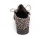 Django & Juliette Kotty loafer in taupe leopard print leather with a patent toe cap and lace-up front. Photo of back view.