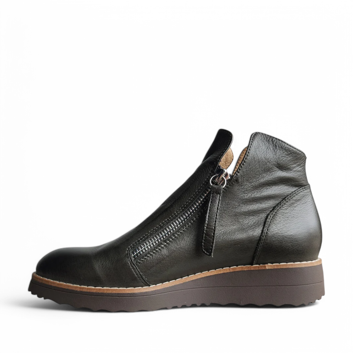 DJANGO & JULIET ohmy olive leather ankle boots with asymmetrical front zipper and low wedge heel. Photo of left side view.