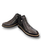 DJANGO & JULIETTE Opal black leather flatform bootie with check embossed pattern and side zipper. Photo of front side view 1.