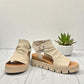 DJANGO & JULIETTE Rufuss beige leather wedge sandals with cut-out design and chunky synthetic sole. Photo of front side view 2.