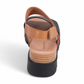 Django & Juliette Runar black tan platform sandals in black and tan leather with an adjustable slingback strap. Photo of back view.