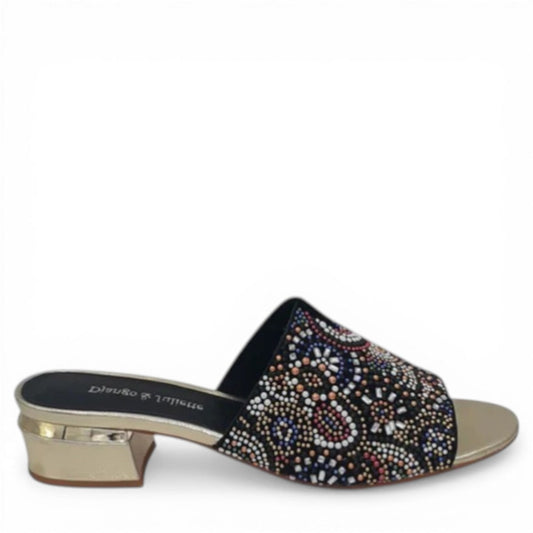 DJANGO & JULIETTE Tammy black suede open-toe mule with a retro patterned upper and low two-tone gold heel. Photo of right side view.