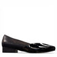 DJANGO & JULIETTE Bavari black leather slip-on heel with a glossy patent toe and low block heel. right view.