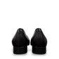 DJANGO & JULIETTE Bavari black leather slip-on heel with a glossy patent toe and low block heel. back view.
