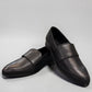 Django & Juliette Gabrian black leather loafers with a low block heel and slip-on design. front view.