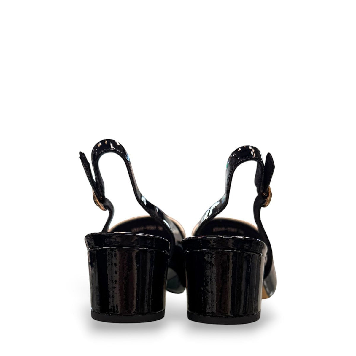 Django & Juliette Aiday black and ivory patent leather slingback block heel shoe with adjustable strap.