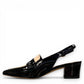 Django & Juliette Aiday black and ivory patent leather slingback block heel shoe with adjustable strap.
