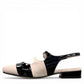 DJANGO & JULIETTE Brynins black and white patent leather slingback Mary Jane flat with block heel. left view.