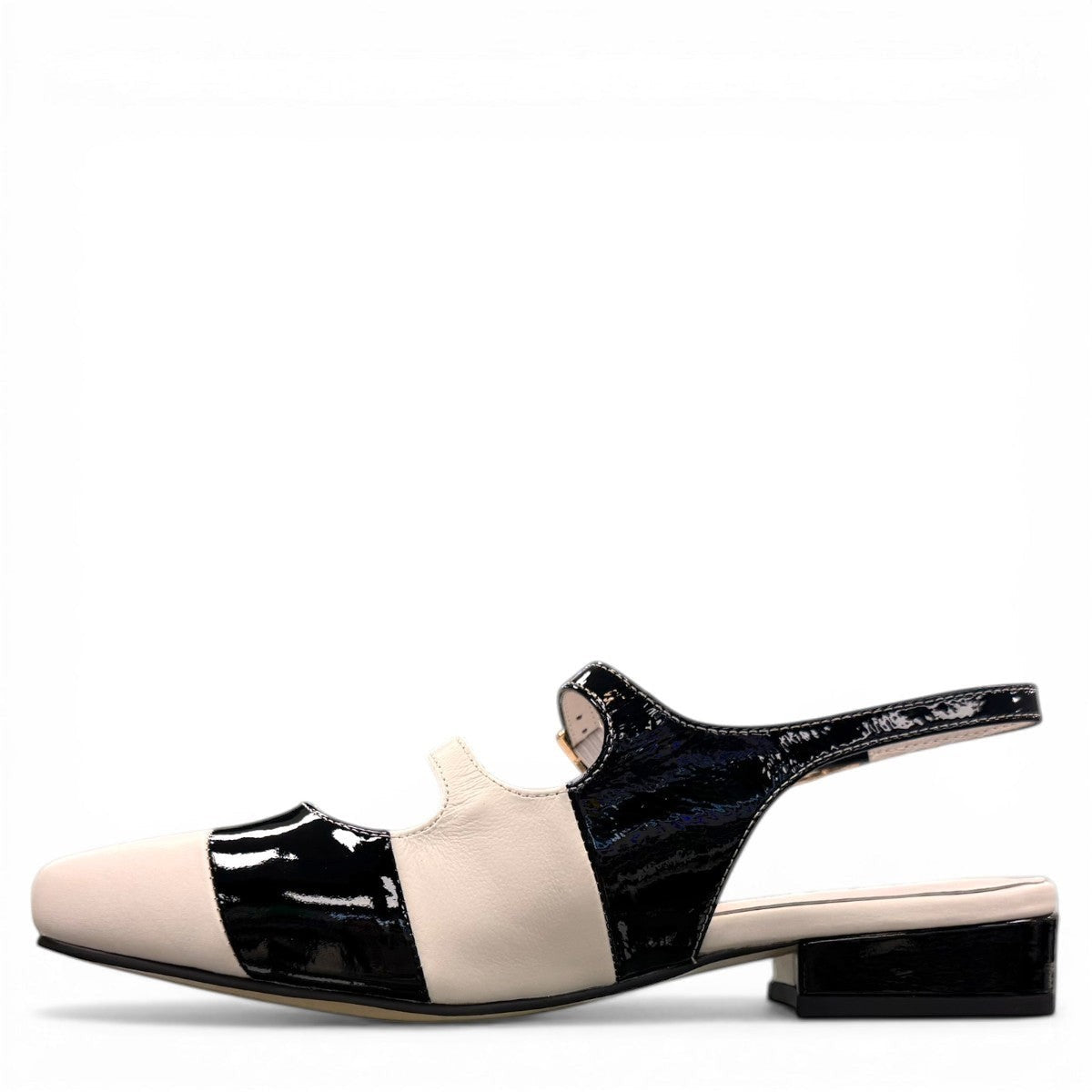 DJANGO & JULIETTE Brynins black and white patent leather slingback Mary Jane flat with block heel. left view.