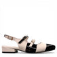 DJANGO & JULIETTE Brynins black and white patent leather slingback Mary Jane flat with block heel. right view.