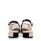 DJANGO & JULIETTE Brynins black and white patent leather slingback Mary Jane flat with block heel. back view.