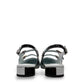 DJANGO & JULIETTE Brynns black and white patent leather slingback Mary Jane flat with buckled straps. back view.