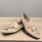 Django & Juliette Gabrian patent leather loafers in milk and black floral print with a low rubber heel. front view.