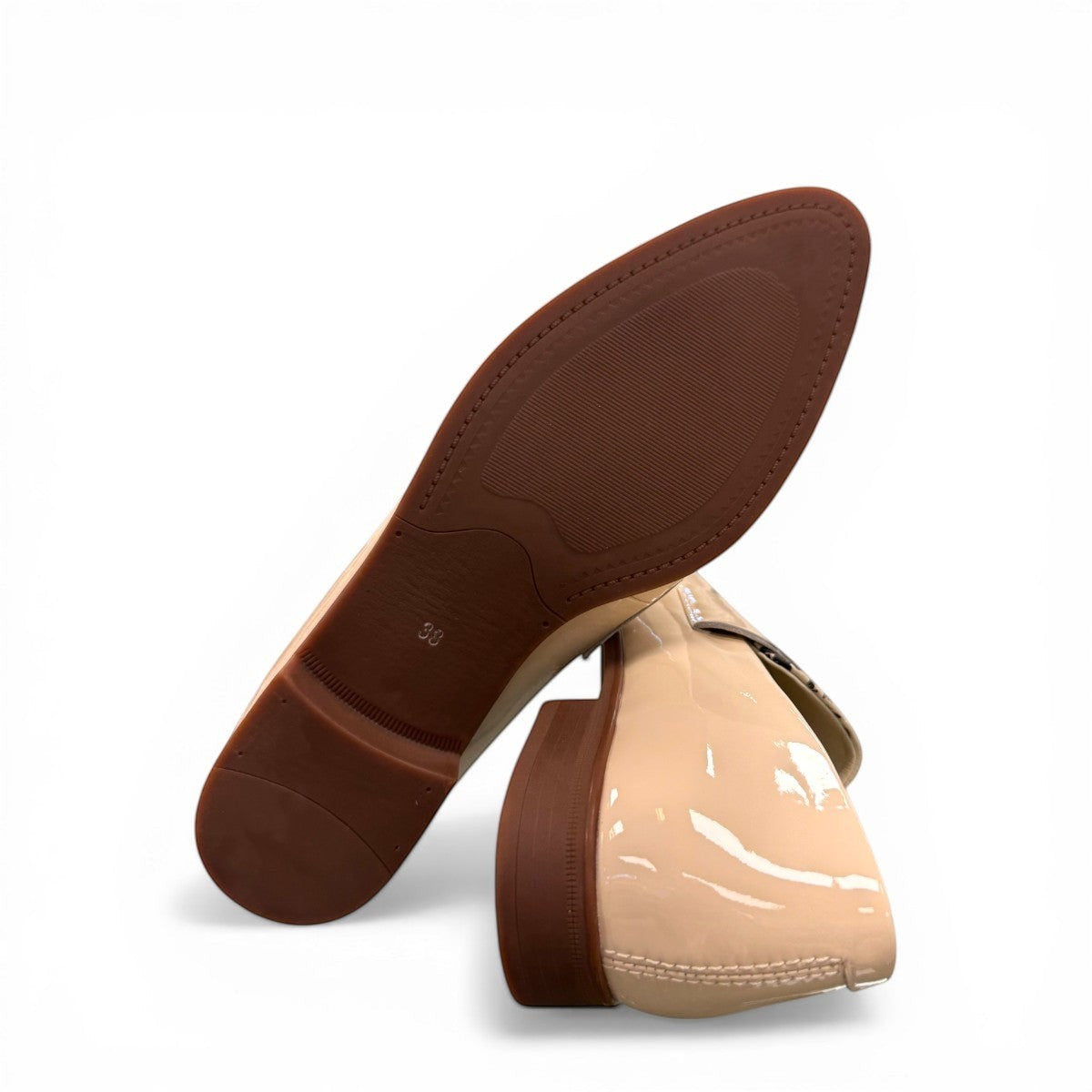 Django & Juliette Gabrian patent leather loafers in milk and black floral print with a low rubber heel. bottom view.