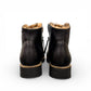 Sina Footwear Django & Juliette Opal black leather flatform wedge bootie with side zipper and fur-lined interior. Photo of back view.