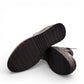Sina Footwear Django & Juliette Opal black leather flatform wedge bootie with side zipper and fur-lined interior. Photo of bottom view.