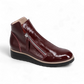 Sina Footwear DJANGO & JULIETTE wine patent leather sneaker-style ankle bootie with twin-zip and black rubber sole. Photo of front side view.
