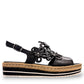DJANGO & JULIETTE black leather platform sandal with floral cut-outs and woven espadrille trim. right view.