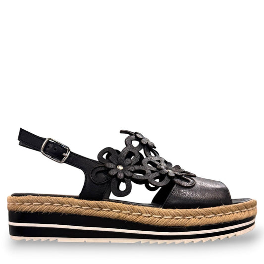 DJANGO & JULIETTE black leather platform sandal with floral cut-outs and woven espadrille trim. right view.