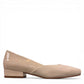 DJANGO & JULIETTE ivory leather and patent block heel pump with a rounded toe and slip-on design. right view.