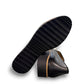 DJANGO & JULIETTE black leather platform loafers with a white and black polka dot bow detail. bottom view.