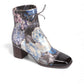Django & Juliette Valina floral patent leather ankle boots with a square toe and block heel. front view.