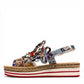 DJANGO & JULIETTE Aldo platform sandal with floral cut-outs, collage print patent leather, and espadrille. left view.