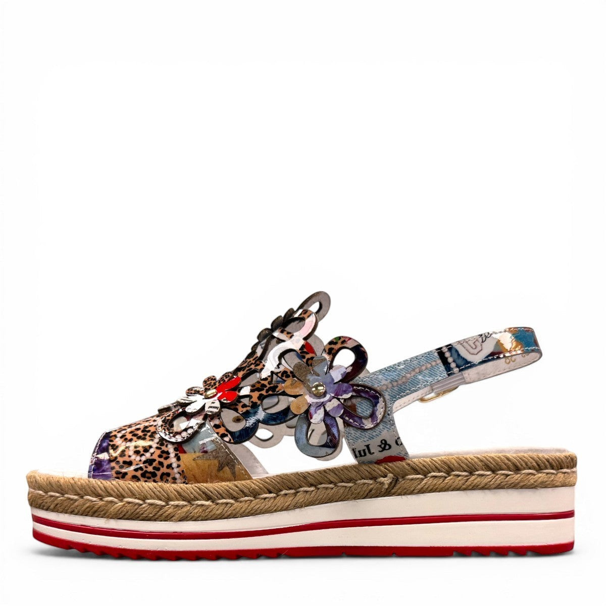 DJANGO & JULIETTE Aldo platform sandal with floral cut-outs, collage print patent leather, and espadrille. left view.