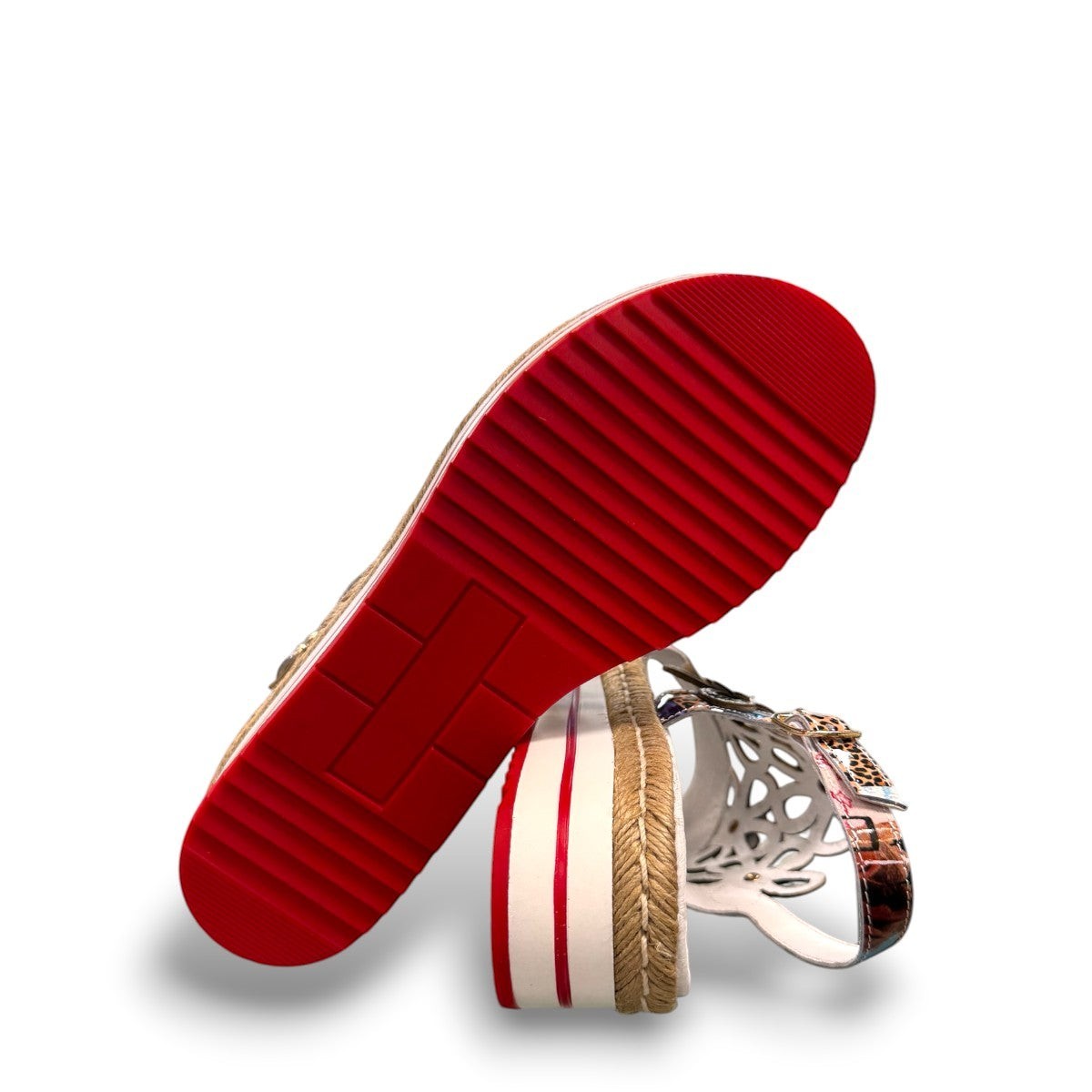 DJANGO & JULIETTE Aldo platform sandal with floral cut-outs, collage print patent leather, and espadrille. bottom view.