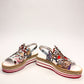 DJANGO & JULIETTE Aldo platform sandal with floral cut-outs, collage print patent leather, and espadrille. front view.