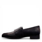 Django & Juliette Gabrian black leather loafers with a low block heel and slip-on design. left view.
