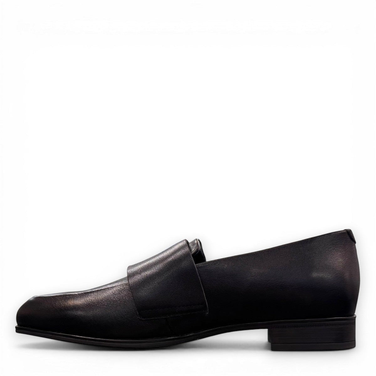 Django & Juliette Gabrian black leather loafers with a low block heel and slip-on design. left view.