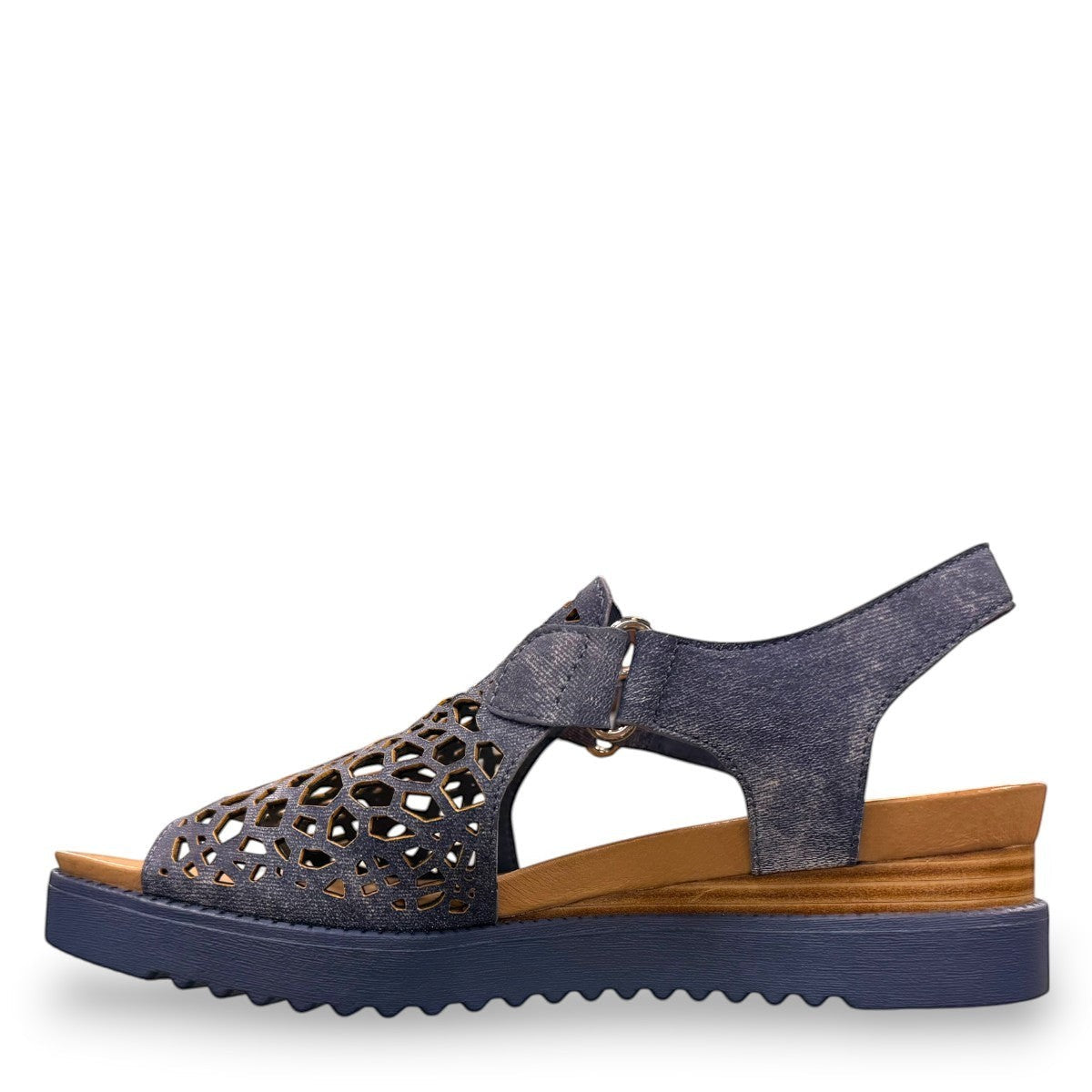 Django & Juliette blue denim leather flatform sandals with intricate laser-cut patterns and sporty sole.left view.