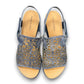 Django & Juliette blue denim leather flatform sandals with intricate laser-cut patterns and sporty sole. top view.
