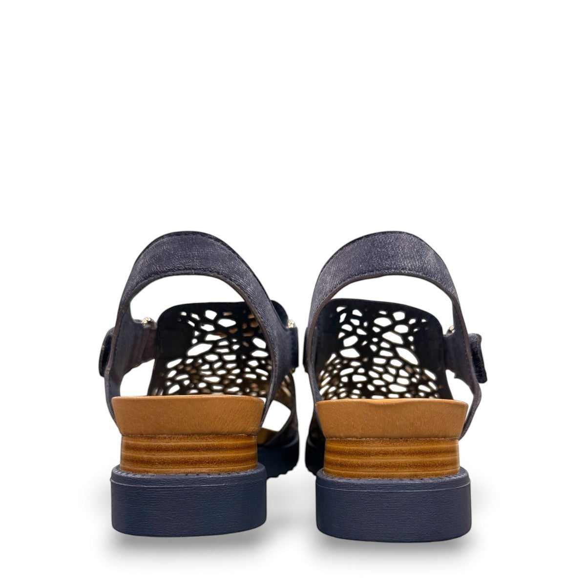 Django & Juliette blue denim leather flatform sandals with intricate laser-cut patterns and sporty sole. back view.