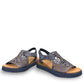Django & Juliette blue denim leather flatform sandals with intricate laser-cut patterns and sporty sole. front view.