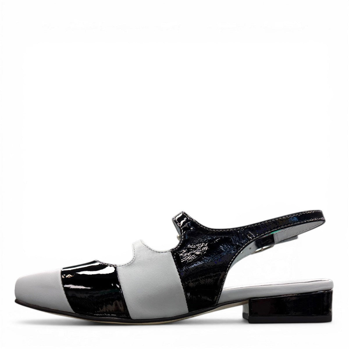 DJANGO & JULIETTE Brynns black and white patent leather slingback Mary Jane flat with buckled straps.
left view.