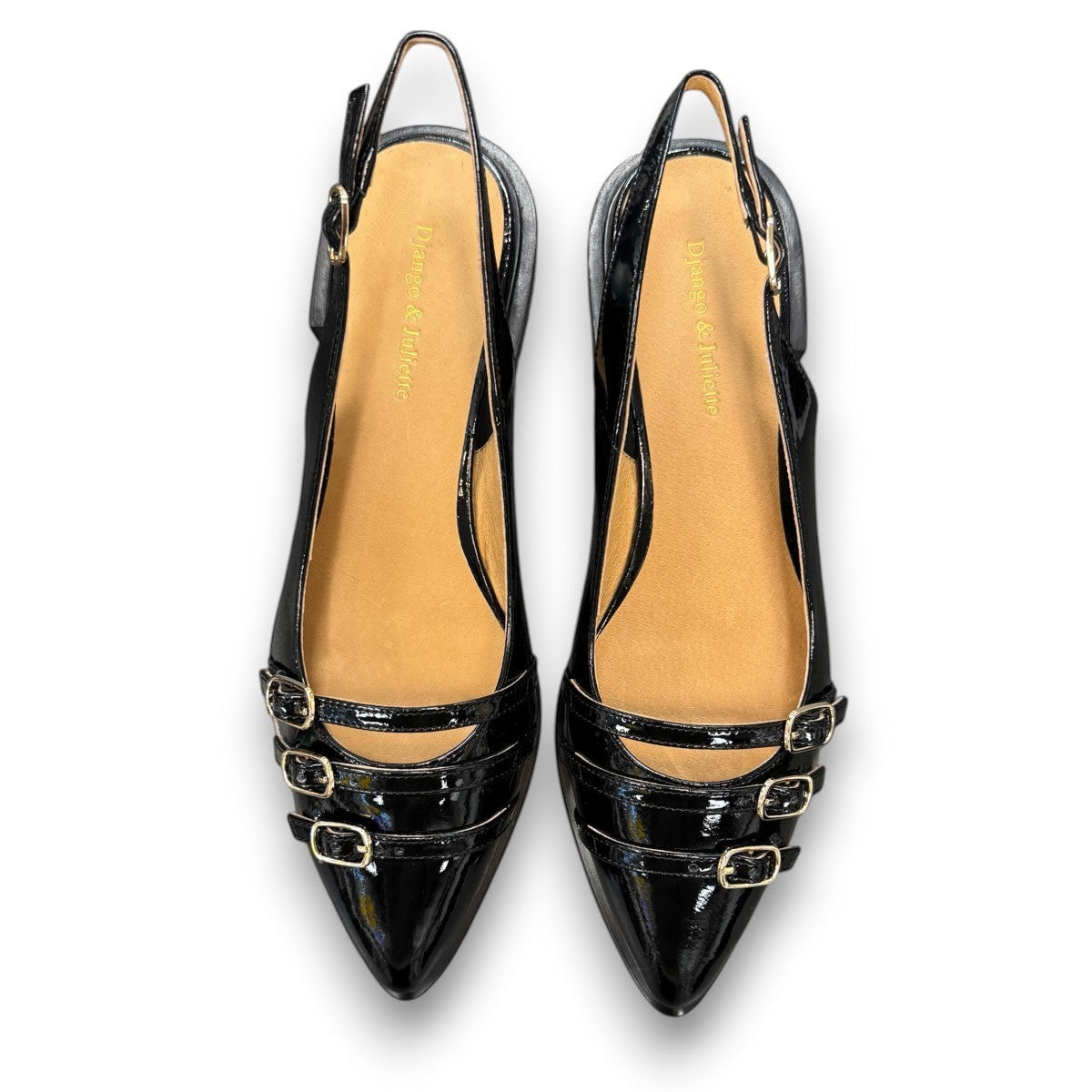 DJANGO & JULIETTE Eshano black patent leather slingback flat with triple buckle detail and low heel. 
top view.