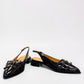 DJANGO & JULIETTE Eshano black patent leather slingback flat with triple buckle detail and low heel. 
front view.